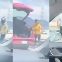 VIDEO Hombre pelea con repartidor y lo avienta de un puente